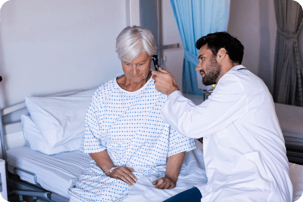 hearing check of old patient