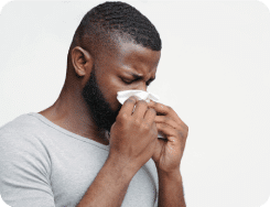 A man experiencing sinusitis problems.